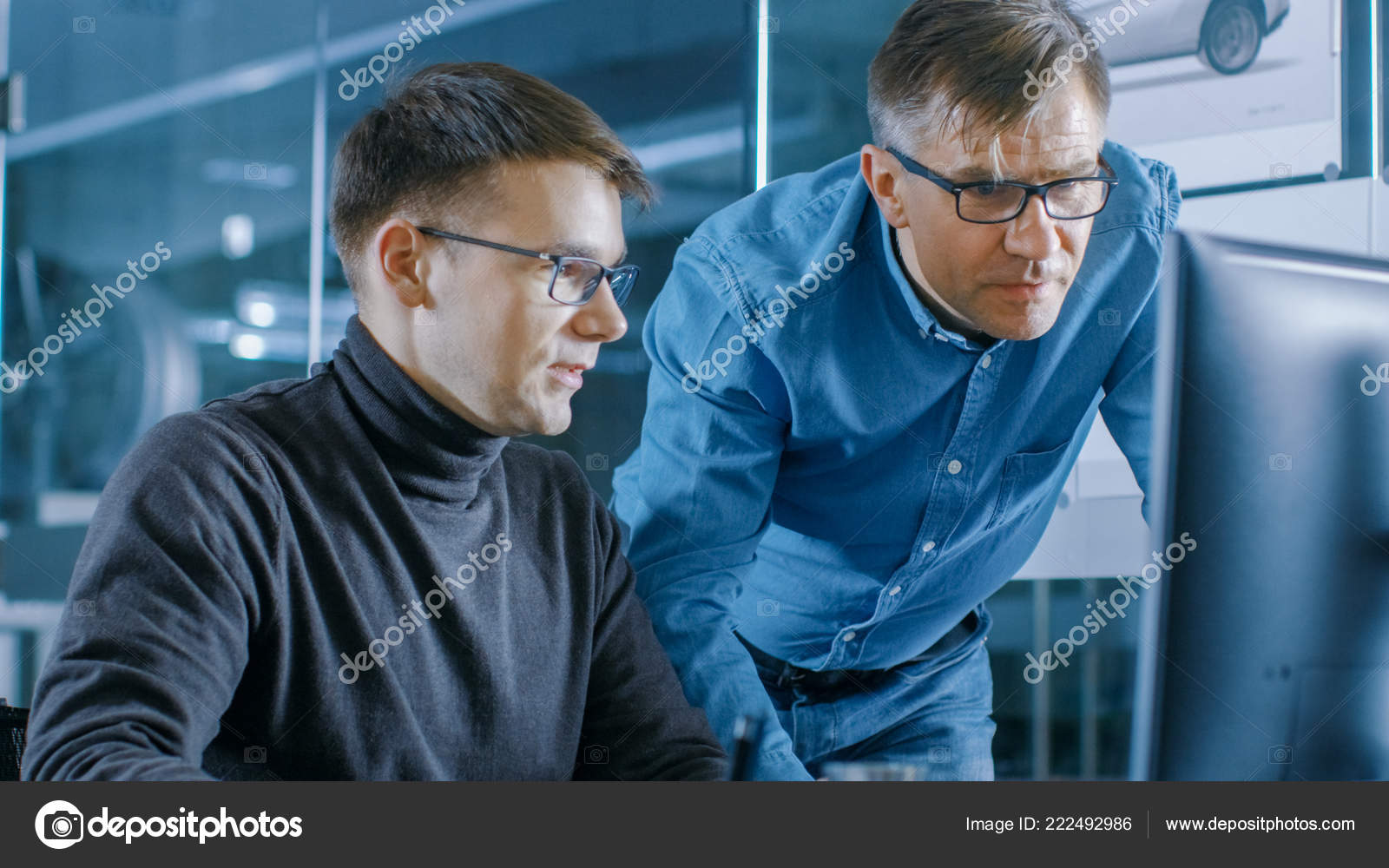 Experienced Senior Engineer Consults Young Designer about Project, They Have Discussion and Work on a Personal Computer.